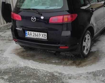 Черный Мазда 2, объемом двигателя 1.4 л и пробегом 262 тыс. км за 4405 $, фото 3 на Automoto.ua