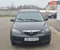 Черный Мазда 2, объемом двигателя 1.39 л и пробегом 240 тыс. км за 3500 $, фото 1 на Automoto.ua