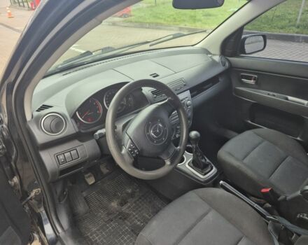 Черный Мазда 2, объемом двигателя 1.4 л и пробегом 240 тыс. км за 3500 $, фото 7 на Automoto.ua