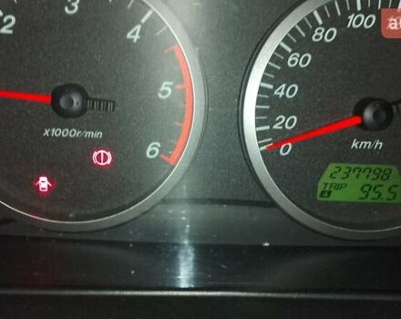 Черный Мазда 2, объемом двигателя 1.4 л и пробегом 237 тыс. км за 4300 $, фото 2 на Automoto.ua