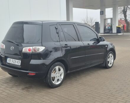 Черный Мазда 2, объемом двигателя 1.4 л и пробегом 240 тыс. км за 3500 $, фото 4 на Automoto.ua