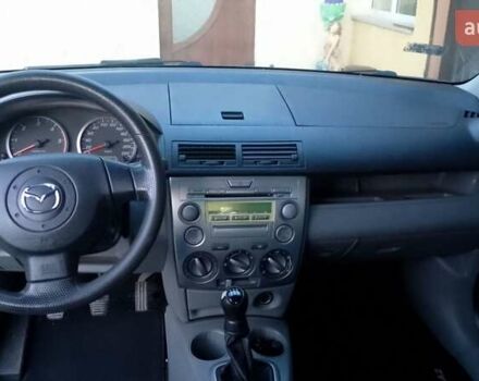 Черный Мазда 2, объемом двигателя 1.4 л и пробегом 237 тыс. км за 4300 $, фото 4 на Automoto.ua