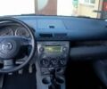 Черный Мазда 2, объемом двигателя 1.4 л и пробегом 237 тыс. км за 4300 $, фото 4 на Automoto.ua