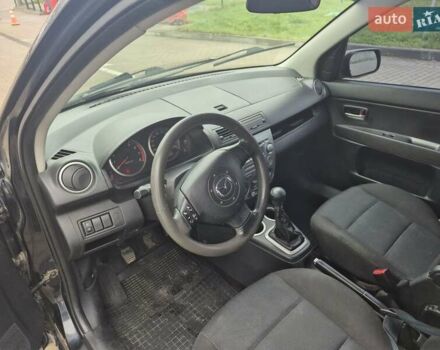 Черный Мазда 2, объемом двигателя 1.39 л и пробегом 240 тыс. км за 3500 $, фото 7 на Automoto.ua