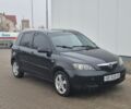 Черный Мазда 2, объемом двигателя 1.4 л и пробегом 240 тыс. км за 3500 $, фото 5 на Automoto.ua