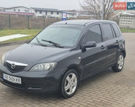 Черный Мазда 2, объемом двигателя 1.39 л и пробегом 240 тыс. км за 3500 $, фото 1 на Automoto.ua