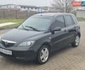 Черный Мазда 2, объемом двигателя 1.39 л и пробегом 240 тыс. км за 3500 $, фото 1 на Automoto.ua