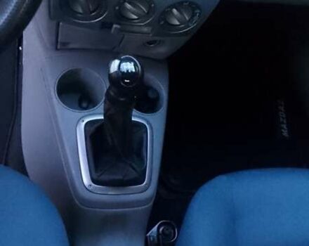 Черный Мазда 2, объемом двигателя 1.4 л и пробегом 237 тыс. км за 4300 $, фото 3 на Automoto.ua