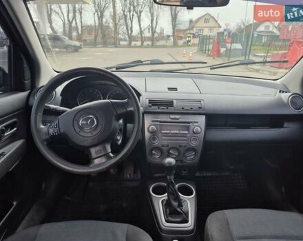 Черный Мазда 2, объемом двигателя 1.39 л и пробегом 240 тыс. км за 3500 $, фото 6 на Automoto.ua