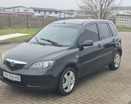 Черный Мазда 2, объемом двигателя 1.4 л и пробегом 240 тыс. км за 3500 $, фото 1 на Automoto.ua