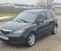Черный Мазда 2, объемом двигателя 1.4 л и пробегом 240 тыс. км за 3500 $, фото 1 на Automoto.ua