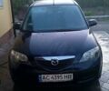 Черный Мазда 2, объемом двигателя 1.4 л и пробегом 237 тыс. км за 4300 $, фото 1 на Automoto.ua