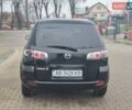 Черный Мазда 2, объемом двигателя 1.39 л и пробегом 240 тыс. км за 3500 $, фото 3 на Automoto.ua