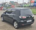 Черный Мазда 2, объемом двигателя 1.39 л и пробегом 240 тыс. км за 3500 $, фото 2 на Automoto.ua