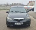 Черный Мазда 2, объемом двигателя 1.4 л и пробегом 240 тыс. км за 3500 $, фото 1 на Automoto.ua