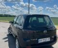 Черный Мазда 2, объемом двигателя 1.4 л и пробегом 237 тыс. км за 3750 $, фото 8 на Automoto.ua