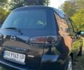 Чорний Мазда 2, об'ємом двигуна 1.39 л та пробігом 238 тис. км за 3550 $, фото 25 на Automoto.ua