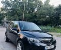 Черный Мазда 2, объемом двигателя 1.4 л и пробегом 237 тыс. км за 3752 $, фото 1 на Automoto.ua