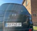 Чорний Мазда 2, об'ємом двигуна 1.39 л та пробігом 238 тис. км за 3550 $, фото 20 на Automoto.ua