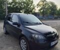 Чорний Мазда 2, об'ємом двигуна 1.4 л та пробігом 205 тис. км за 3700 $, фото 1 на Automoto.ua