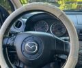 Чорний Мазда 2, об'ємом двигуна 1.39 л та пробігом 238 тис. км за 3550 $, фото 41 на Automoto.ua