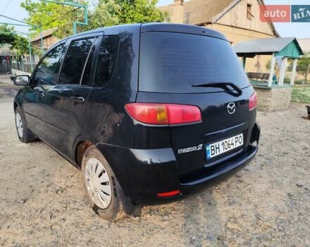 Чорний Мазда 2, об'ємом двигуна 1.4 л та пробігом 205 тис. км за 3700 $, фото 9 на Automoto.ua