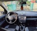 Чорний Мазда 2, об'ємом двигуна 1.4 л та пробігом 205 тис. км за 3700 $, фото 4 на Automoto.ua