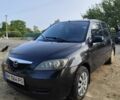 Чорний Мазда 2, об'ємом двигуна 1.4 л та пробігом 205 тис. км за 3700 $, фото 1 на Automoto.ua
