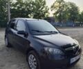 Черный Мазда 2, объемом двигателя 1.4 л и пробегом 205 тыс. км за 3700 $, фото 1 на Automoto.ua