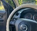 Чорний Мазда 2, об'ємом двигуна 1.39 л та пробігом 238 тис. км за 3550 $, фото 44 на Automoto.ua