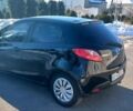 Черный Мазда 2, объемом двигателя 1.35 л и пробегом 260 тыс. км за 4450 $, фото 4 на Automoto.ua