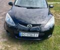 Черный Мазда 2, объемом двигателя 1.35 л и пробегом 262 тыс. км за 3999 $, фото 1 на Automoto.ua