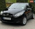 Черный Мазда 2, объемом двигателя 1.4 л и пробегом 190 тыс. км за 3850 $, фото 1 на Automoto.ua