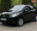 Черный Мазда 2, объемом двигателя 1.4 л и пробегом 190 тыс. км за 3750 $, фото 1 на Automoto.ua