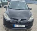 Чорний Мазда 2, об'ємом двигуна 1.35 л та пробігом 160 тис. км за 4950 $, фото 1 на Automoto.ua