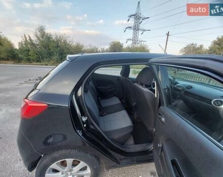 Черный Мазда 2, объемом двигателя 1.35 л и пробегом 187 тыс. км за 4800 $, фото 4 на Automoto.ua