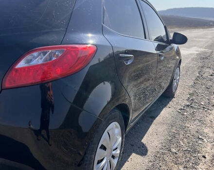 Черный Мазда 2, объемом двигателя 1.3 л и пробегом 250 тыс. км за 4200 $, фото 3 на Automoto.ua