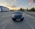 Черный Мазда 2, объемом двигателя 1.35 л и пробегом 187 тыс. км за 4800 $, фото 1 на Automoto.ua