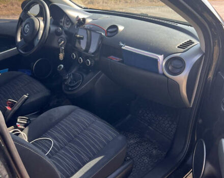 Черный Мазда 2, объемом двигателя 1.3 л и пробегом 250 тыс. км за 4200 $, фото 7 на Automoto.ua