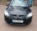 Черный Мазда 2, объемом двигателя 1.3 л и пробегом 260 тыс. км за 4150 $, фото 1 на Automoto.ua