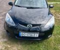 Черный Мазда 2, объемом двигателя 1.3 л и пробегом 261 тыс. км за 4150 $, фото 1 на Automoto.ua
