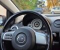Черный Мазда 2, объемом двигателя 1.5 л и пробегом 156 тыс. км за 5300 $, фото 25 на Automoto.ua