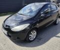 Черный Мазда 2, объемом двигателя 1.4 л и пробегом 178 тыс. км за 5200 $, фото 1 на Automoto.ua