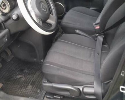 Черный Мазда 2, объемом двигателя 1.5 л и пробегом 226 тыс. км за 5500 $, фото 1 на Automoto.ua