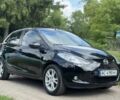 Черный Мазда 2, объемом двигателя 1.4 л и пробегом 233 тыс. км за 3599 $, фото 1 на Automoto.ua
