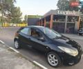Черный Мазда 2, объемом двигателя 1.35 л и пробегом 128 тыс. км за 4800 $, фото 5 на Automoto.ua