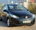 Черный Мазда 2, объемом двигателя 1.4 л и пробегом 186 тыс. км за 4999 $, фото 1 на Automoto.ua