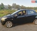 Черный Мазда 2, объемом двигателя 1.35 л и пробегом 128 тыс. км за 4800 $, фото 8 на Automoto.ua