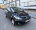 Черный Мазда 2, объемом двигателя 1.4 л и пробегом 236 тыс. км за 1500 $, фото 1 на Automoto.ua