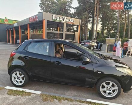 Черный Мазда 2, объемом двигателя 1.35 л и пробегом 128 тыс. км за 4800 $, фото 7 на Automoto.ua